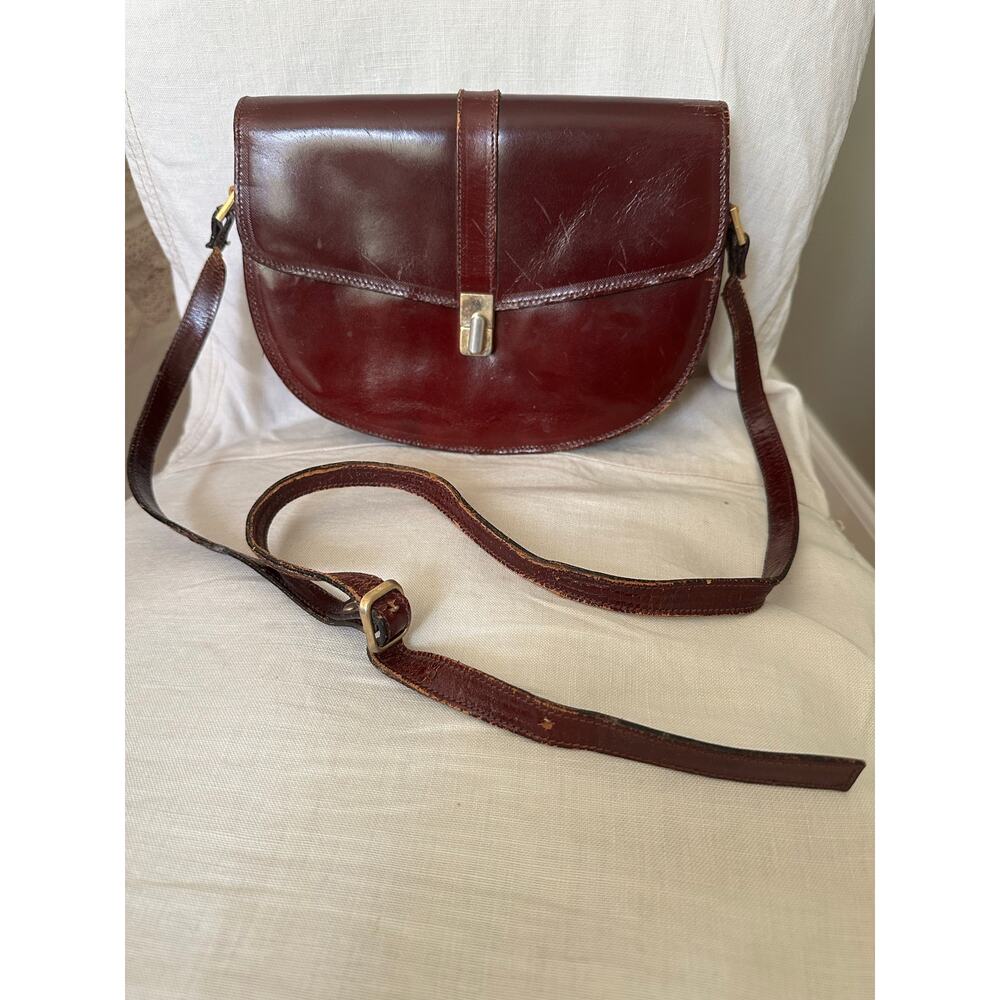 vintage Rappi burgundy leather crossbody saddle purse. Made in Italy 9x6”